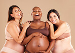 Portrait, beauty and body with pregnant friends in studio on a beige background for diversity or motherhood. Family, love and pregnancy with a woman friend group showing their baby bump stomach