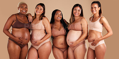 Buy stock photo Pregnancy body, portrait and bonding women on studio background in diversity empowerment, baby support and community. Smile, happy and pregnant friends in underwear with stomach growth, touch or love