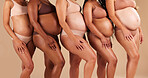 Pregnant body, women or stomach in row on studio background in community, diversity or baby support group. Friends, people or bonding mothers in underwear for belly growth or healthcare development