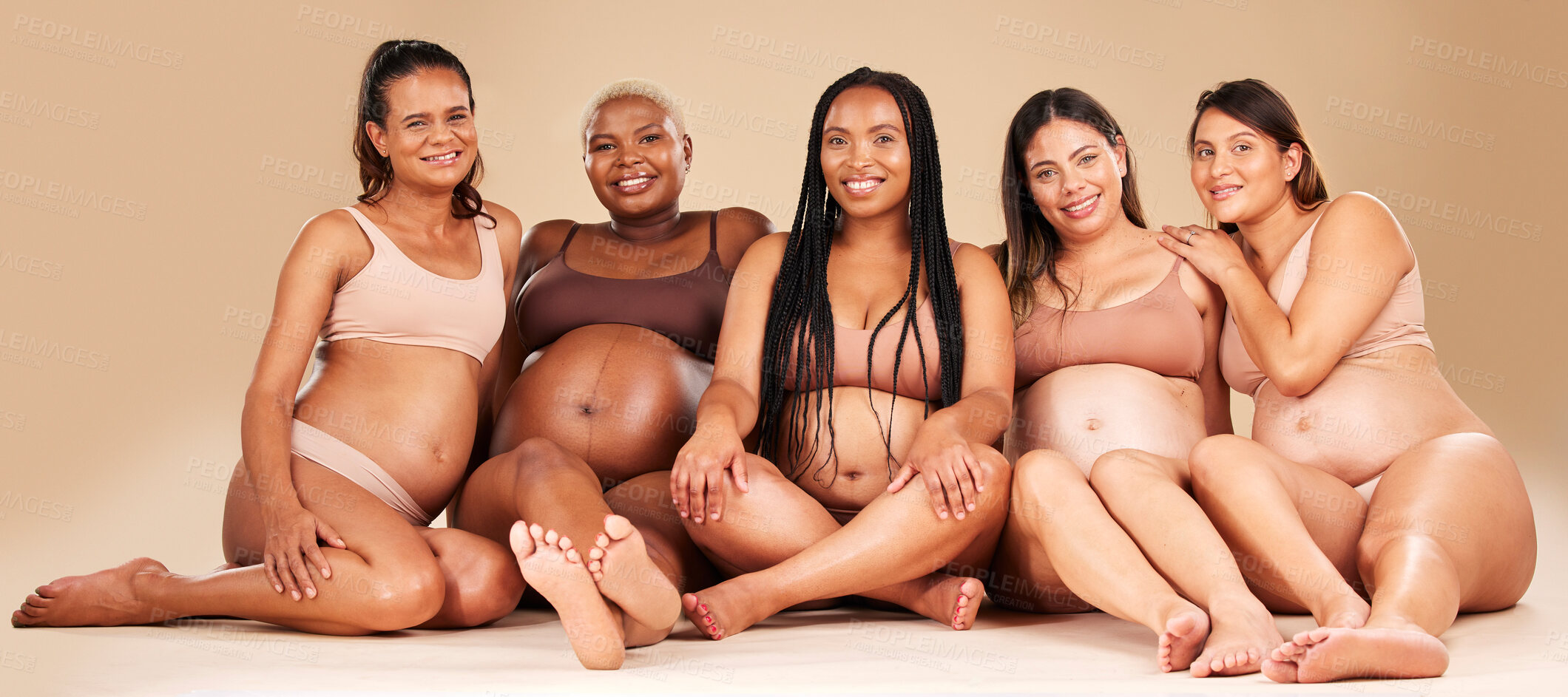 Buy stock photo Portrait, group or pregnancy friends sitting in underwear in community bonding, diversity support or body empowerment. Happy smile, floor or pregnant women in healthcare wellness, future baby or love