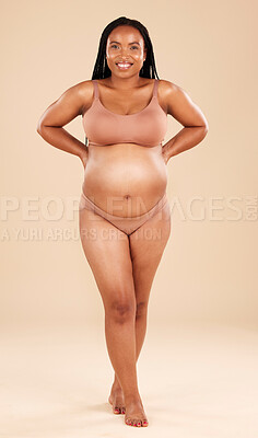 Buy stock photo Pregnancy portrait, underwear and studio woman with smile, happy and excited for baby, stomach growth or motherhood. Gynecology, maternity and pregnant African model with healthcare, love and hope