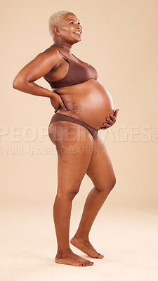 Buy stock photo Happy pregnancy, underwear and studio woman with happiness, smile and excited for baby, stomach growth or motherhood. Gynecology, maternity and pregnant African model with healthcare, love and hope