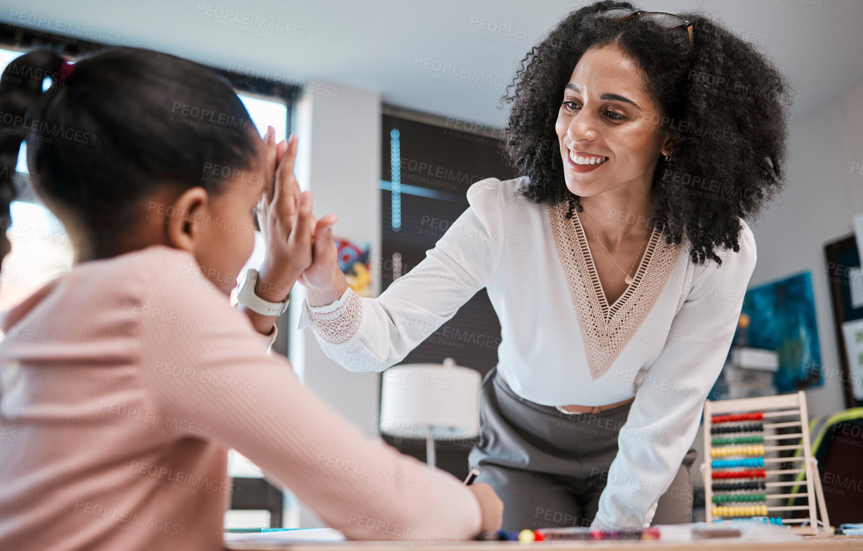 Buy stock photo High five, success or teacher in celebration with a student in a classroom with learning development. Goals, education or happy black woman smiles teaching or celebrates a target with a school girl