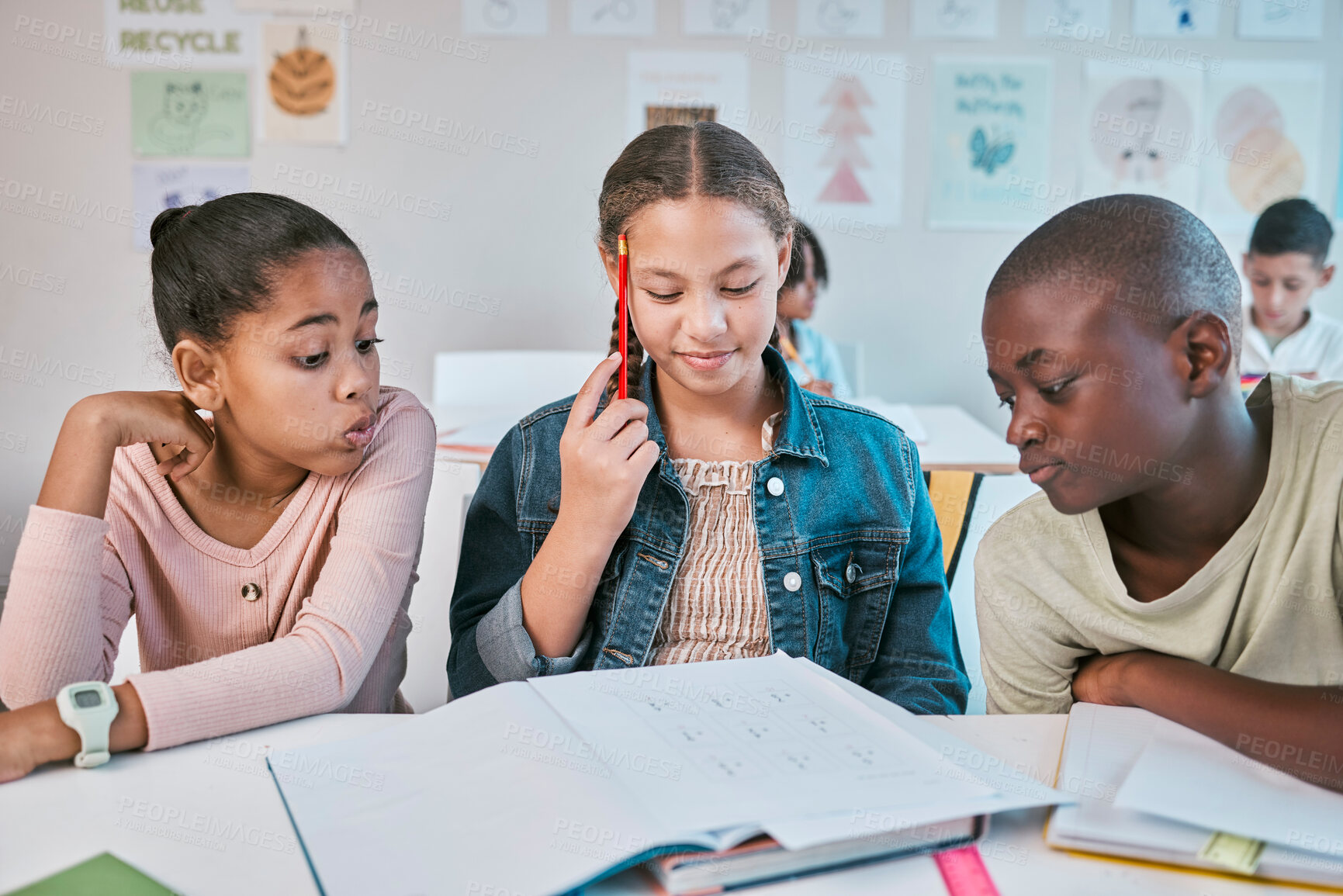 Buy stock photo Education, thinking and group of children in classroom working together on project in Montessori school. Books, help and diversity, students writing math test, brainstorming and helping with answers.