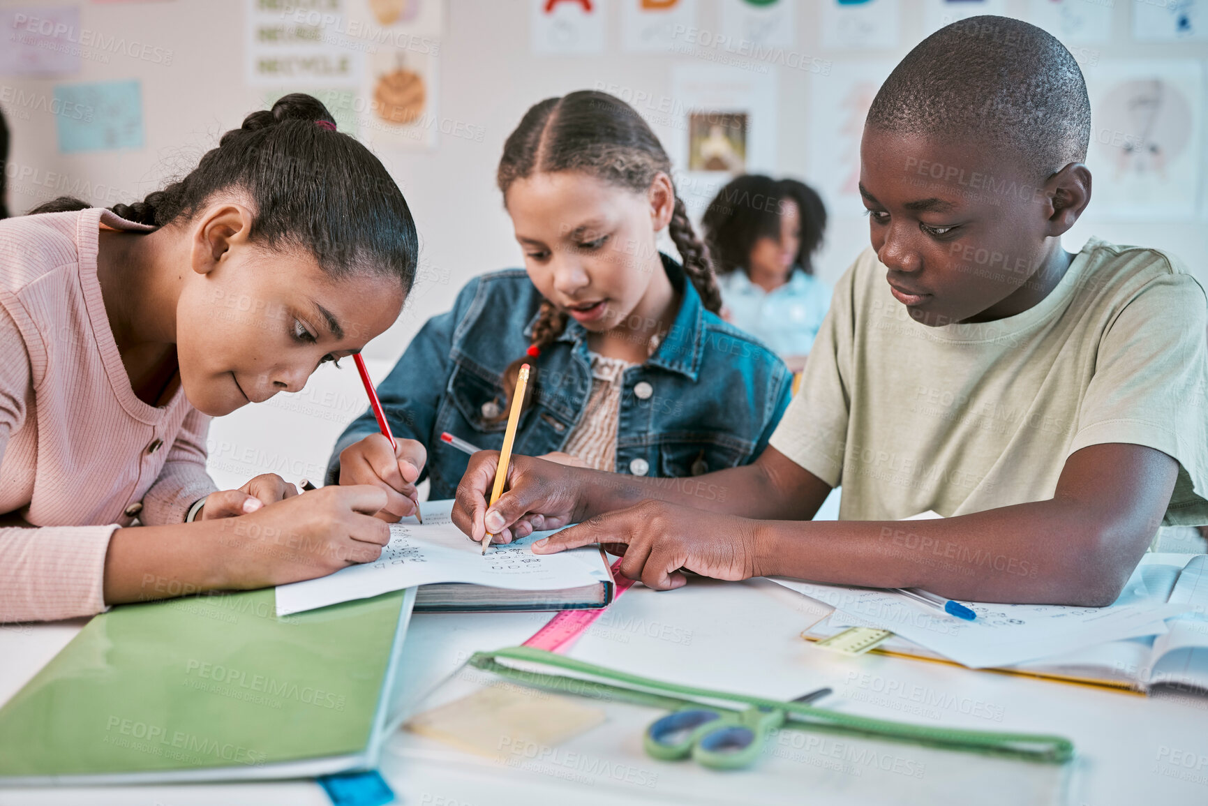 Buy stock photo Teamwork, education, and group of children in classroom working together on project in Montessori school. Books, help and diversity, young students writing or drawing in notebook for fun art homework