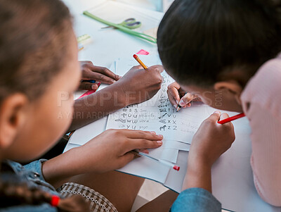 Buy stock photo School, kids and hands writing for learning activity in group classroom together with top view. Young children and students working on literacy and academic exercises for development at desk.

