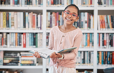 Buy stock photo Girl, library book and portrait of a school student ready for learning, reading and studying. Children, knowledge development and education center with a study bookshelf and kid with a happy smile 