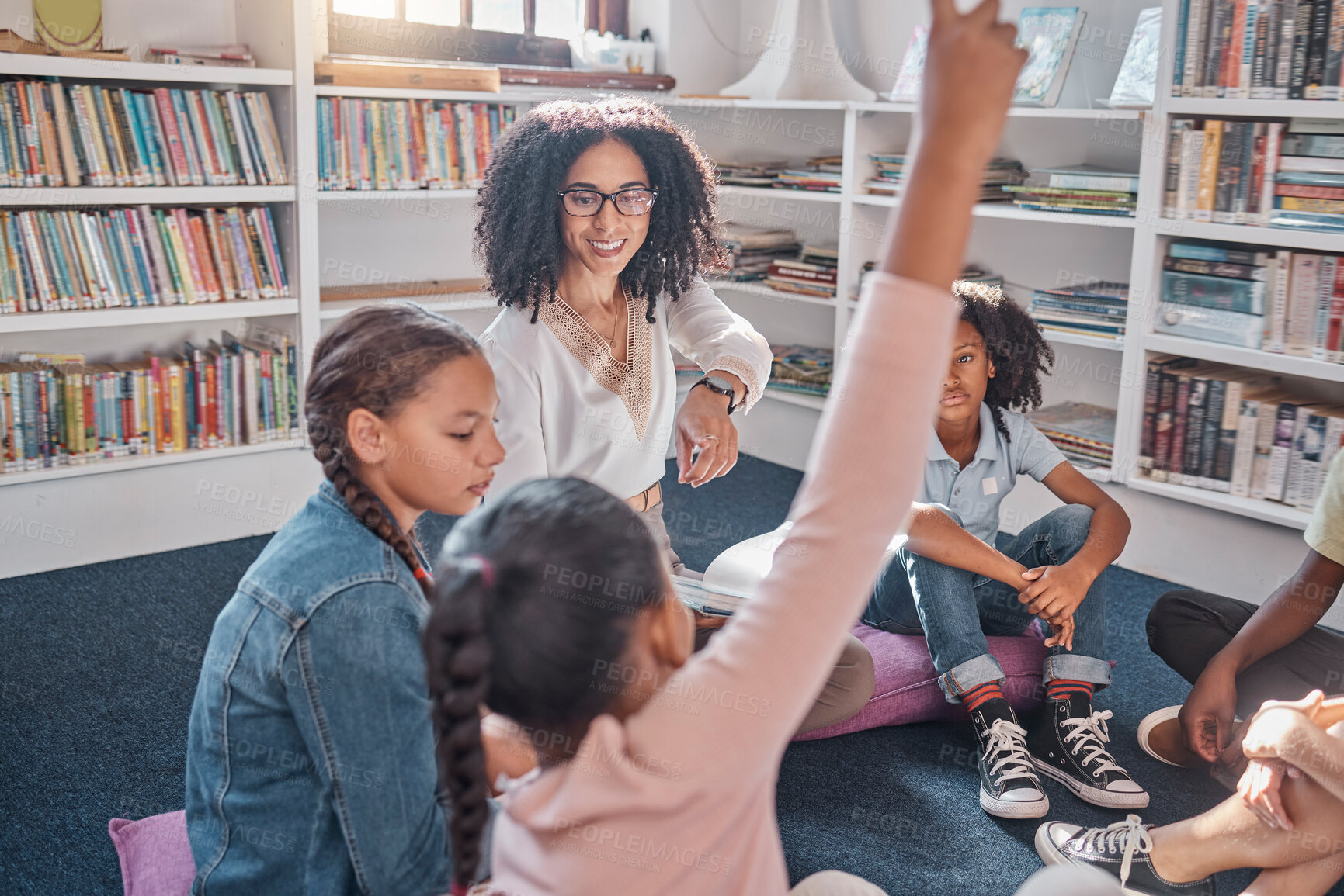 Buy stock photo Raise hand, education and teacher with children in a classroom for learning or child development. Question, academic and black woman tutor teaching smart young kid students or learners at an academy.