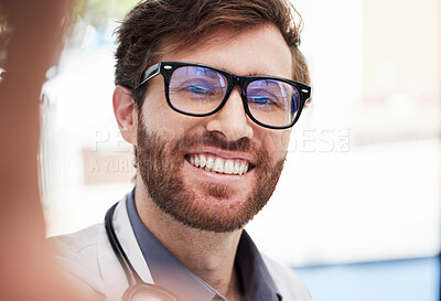 Buy stock photo Doctor, man and selfie with smile at hospital for social media app, profile picture and happy with glasses. Medic, happiness and workplace digital photo for blog, internet or web networking in clinic