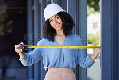 Buy stock photo Construction worker, happy in portrait with black woman and tape measure, architecture and building industry. Measurement, architect and engineering contractor in safety helmet and tools in portrait