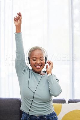 Buy stock photo Music, dance and happy black woman listening to African radio, audio podcast or digital playlist song. Wellness girl, dancing energy and excited dancer hearing, enjoy and streaming sound at home