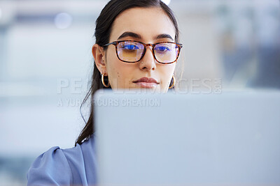 Buy stock photo Business woman, glasses and working on laptop in office, agency and startup company. Focus, face and female worker on computer technology for email, internet planning and professional seo research 