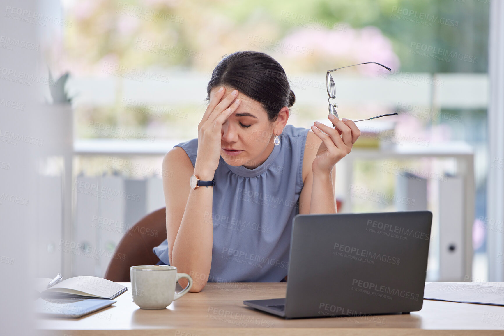 Buy stock photo Stress, headache and business woman in the office doing research or planning a corporate strategy. Migraine, exhausted and tired professional female working on a project with a deadline on a laptop.