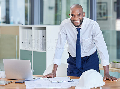 Buy stock photo Portrait, black man and architect in office, laptop and achievement with startup, manager or smile. Nigerian male employee, confident leader or engineer with blueprints, happiness or business success