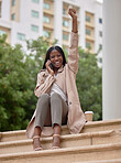 Excited woman, celebration and phone call in city for success, deal or promotion opportunity. Happy black person happy about prize, bonus or winning business competition while outdoor on stairs