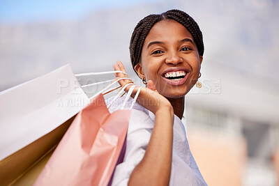 Buy stock photo Shopping bag, black woman and smile portrait outdoor with retail bags after sale and sales promotion. Happy, customer and excited young person in nature feeling freedom after deal and mall discount