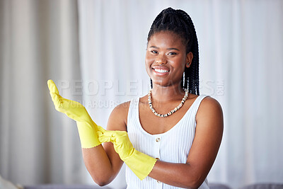 Buy stock photo Cleaning, black woman and cleaner gloves portrait of a girl happy about home health care. House maintenance, smiling main and happiness from housekeeper service employee ready for housework chores