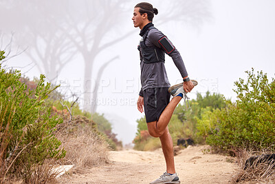 Buy stock photo Fitness, stretching legs and man on nature trail for running, marathon training and cardio workout outdoors. Sports, healthy body and focused male athlete warm up for wellness, exercise and hiking