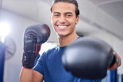 Buy stock photo Fitness, portrait or happy boxer in training, cardio workout or exercise in a sports gym or health club. Face, man or healthy fighter in boxing gloves exercising with motivation, focus or goals 