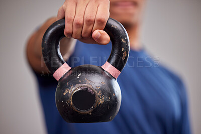 Buy stock photo Fitness, kettlebell and man athlete in a gym for a arm muscle workout or sport training. Sports, weights and healthy male bodybuilder doing a strength exercise in a gymnasium or wellness studio.