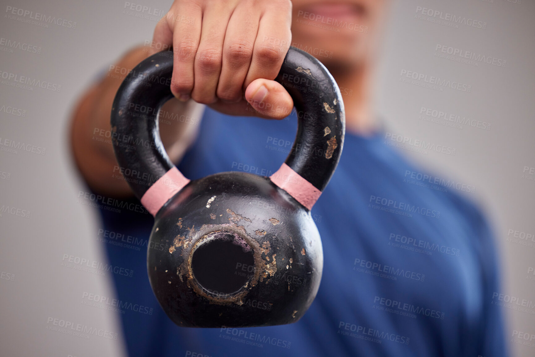 Buy stock photo Fitness, kettlebell and man athlete in a gym for a arm muscle workout or sport training. Sports, weights and healthy male bodybuilder doing a strength exercise in a gymnasium or wellness studio.
