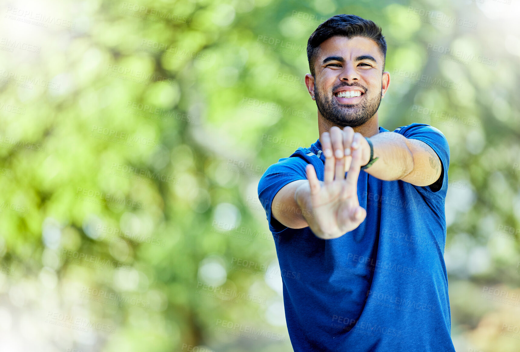 Buy stock photo Fitness, mockup and warm up with a sports man outdoor in nature, stretching before exercise. Workout, mock up and training with a male athlete on a natural green background for health or cardio