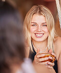 Woman, friends and smile for coffee, conversation or chatting about social life or gossip at an outdoor cafe. Happy female smiling in happiness for warm beverage, discussion or talking to best friend