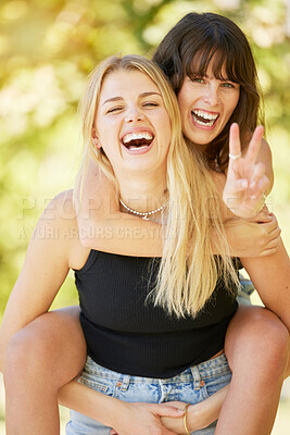 Buy stock photo Woman, friends and smile with peace sign for piggyback, friendship or summer holiday break together in nature. Happy women enjoying back ride, laughing or smiling for fun travel, trip or outdoor walk