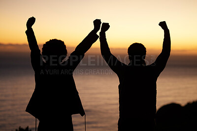 Buy stock photo Sunset, celebration and silhouette of couple at beach enjoying freedom, wellness and adventure outdoors. Victory, success and man with woman celebrate fitness goals, exercise and training achievement