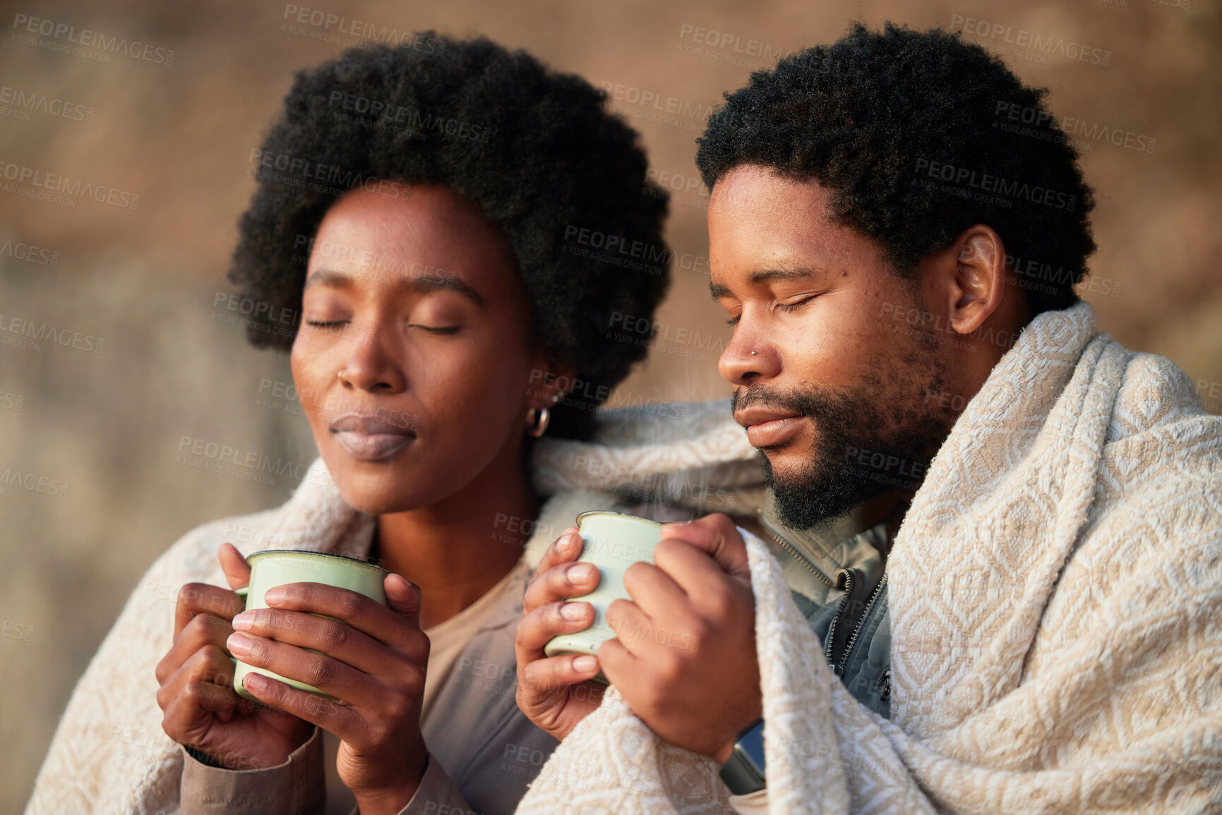 Buy stock photo Relax, peace and camping with black couple and coffee for wake up, hiking and sunrise. Nature, calm and adventure with man and woman and blanket in nature for trekking, mountaineering and discovery 