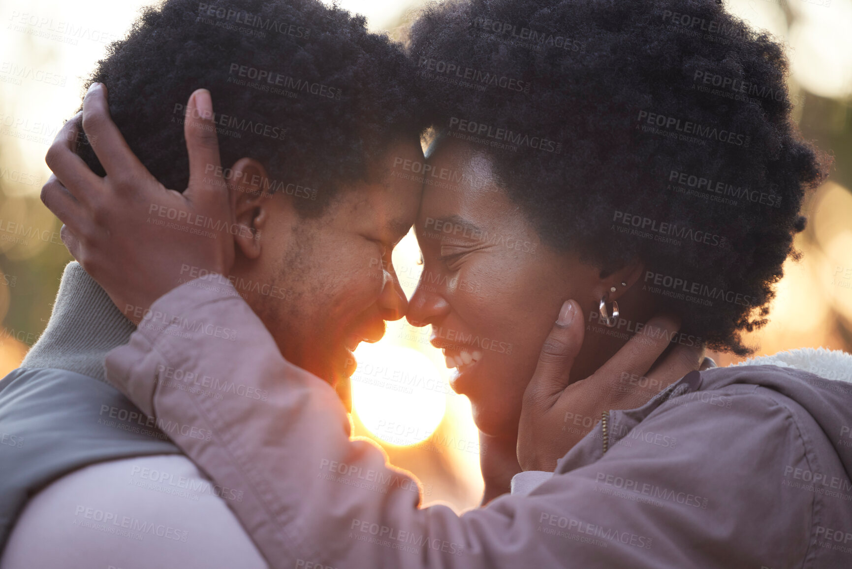 Buy stock photo Couple, love and hiking in sunset kissing and faces touching outdoors after workout, fitness and exercise. Romantic African American healthy people affectionate after training together in nature