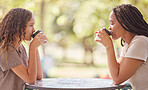 Woman, friends and drinking coffee on table at cafe for social life, catchup or communication outside. Happy women enjoying friendly discussion, talk or drink together in friendship at coffee shop