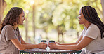 Woman, friends and conversation with coffee at cafe for social life, catchup or communication outside. Happy women enjoying friendly discussion, talk or gossip together in friendship at coffee shop