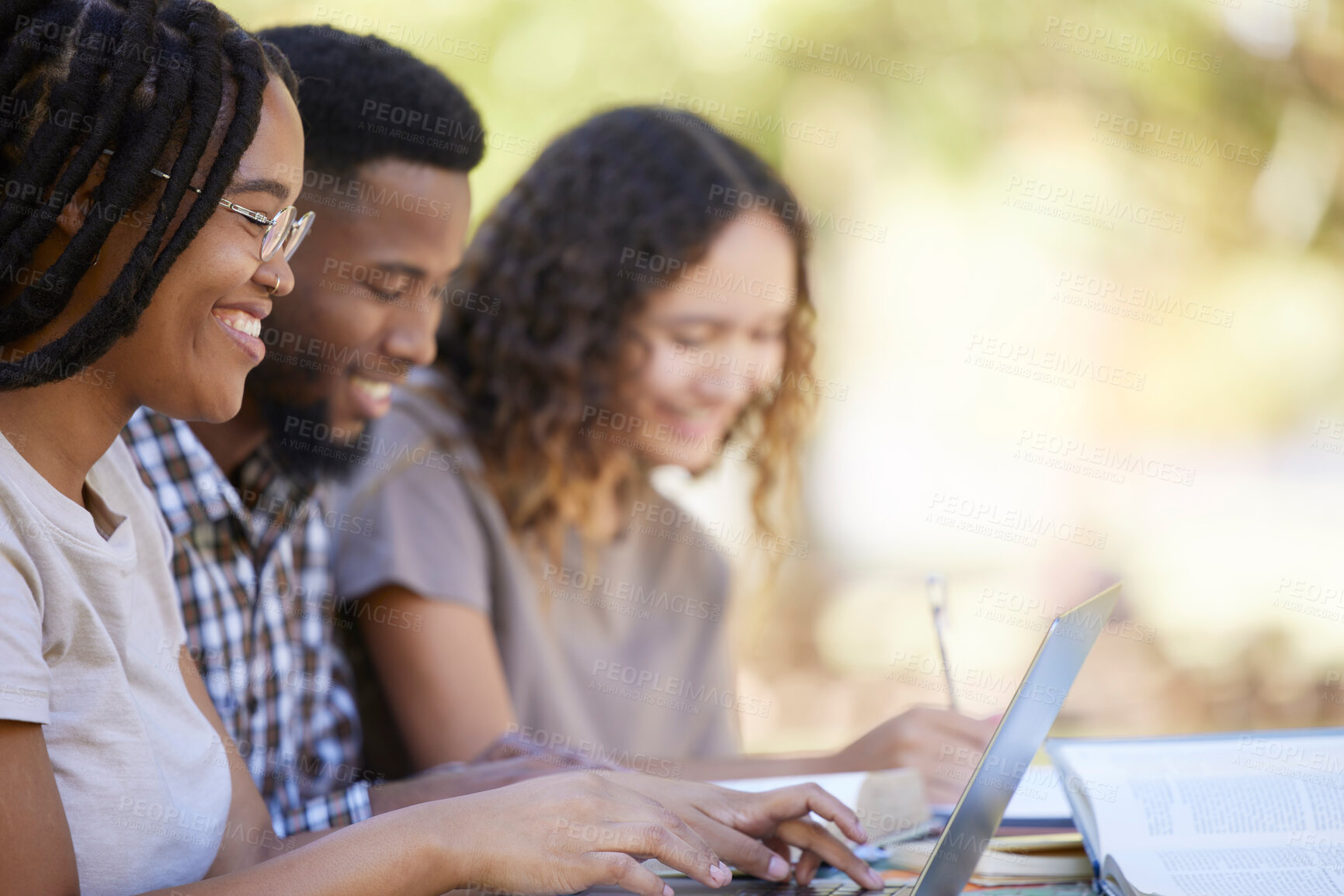 Buy stock photo Laptop, friends and study row in park with black people typing and writing notes for academic exam preparation. Young, happy and gen z college students with books for research together.