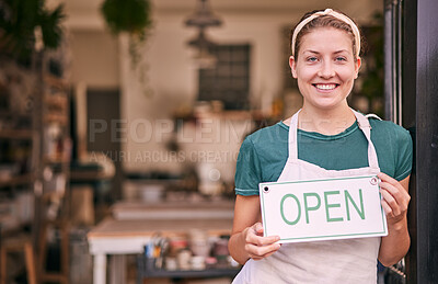 Buy stock photo Woman, pottery and small business with open sign for creative startup, welcome or entrepreneurship at retail store. Portrait of happy shop owner with smile by entrance ready for service at the door
