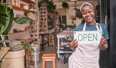 Buy stock photo Creative startup, small business and black woman with open sign for art class, workshop and pottery store. Smile, entrepreneur and girl happy for welcome to ceramic, clay sculpture and retail artwork