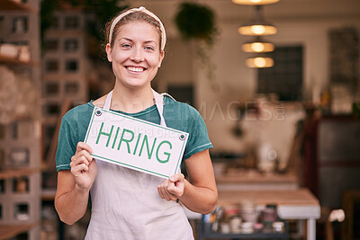 Buy stock photo Woman, small business owner and hiring sign with smile for recruitment, job or startup at pottery store. Portrait of happy CEO manager holding board for hire, opportunity or recruiting at retail shop