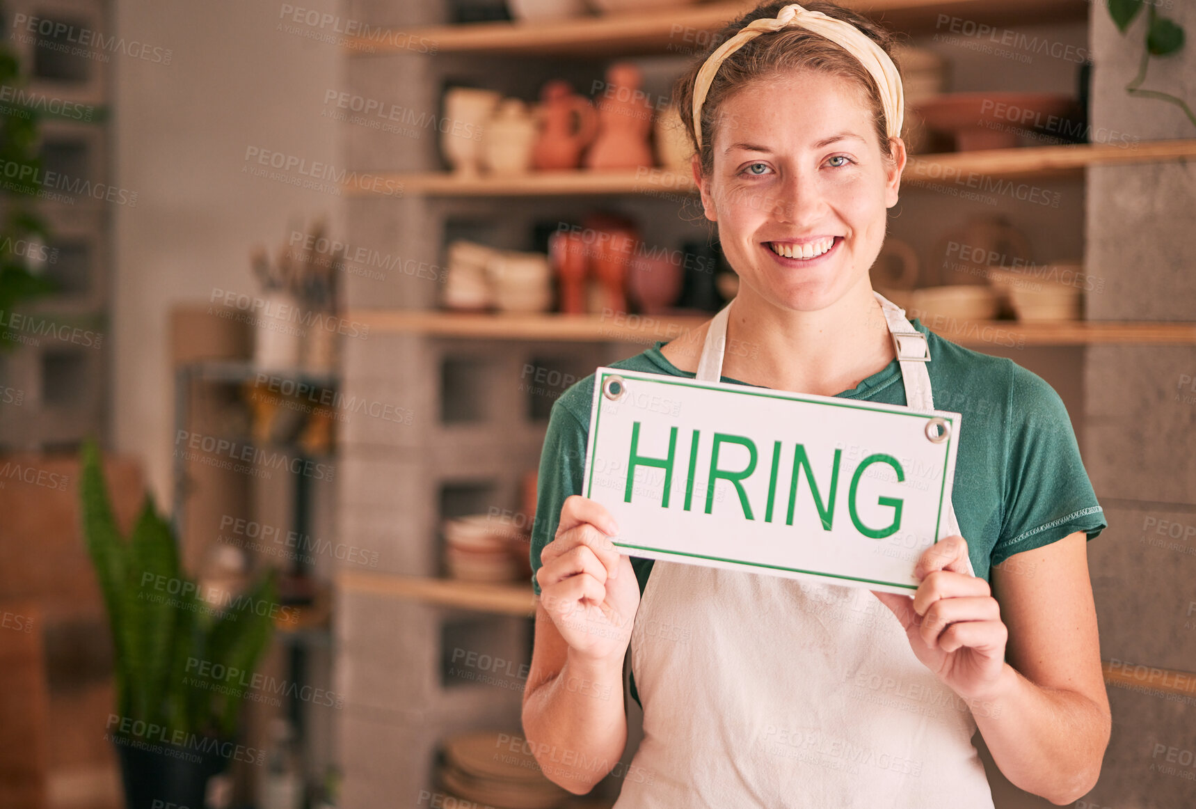 Buy stock photo Hiring sign, portrait and woman business startup in shop recruitment, job advertising and retail experience. Boss, person or employer hand holding a message, banner or board for creative opportunity