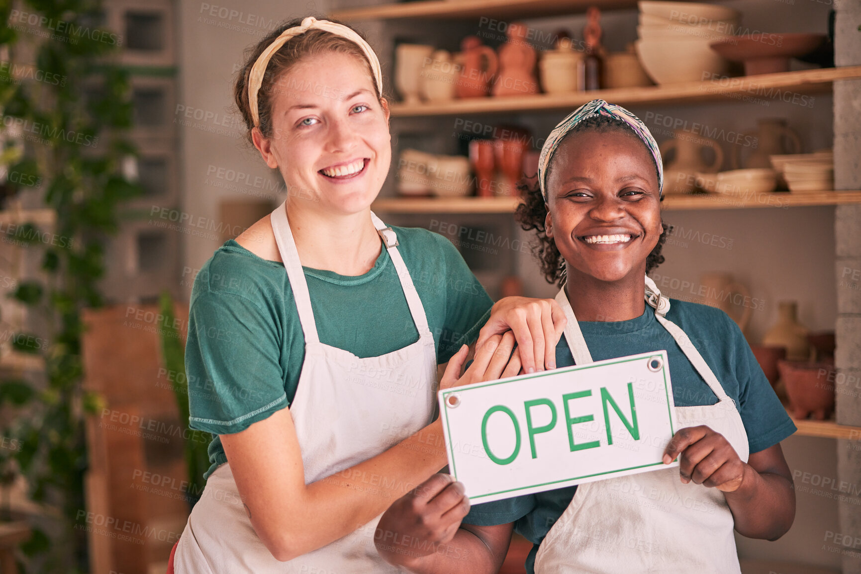 Buy stock photo Small business, pottery and women team with open sign for creative workshop, art studio and startup. Smile, teamwork and entrepreneurs ready for welcome to ceramics, clay sculpture and artwork store