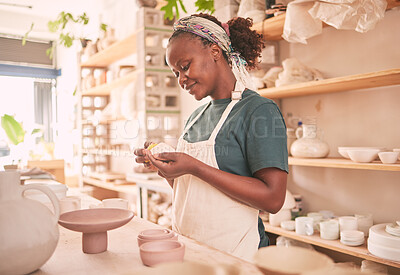 Buy stock photo Pottery, craft and black woman creating with clay for her small business in creative workshop. Creativity, handicraft and African female potter entrepreneur manufacturing product with mud for a store