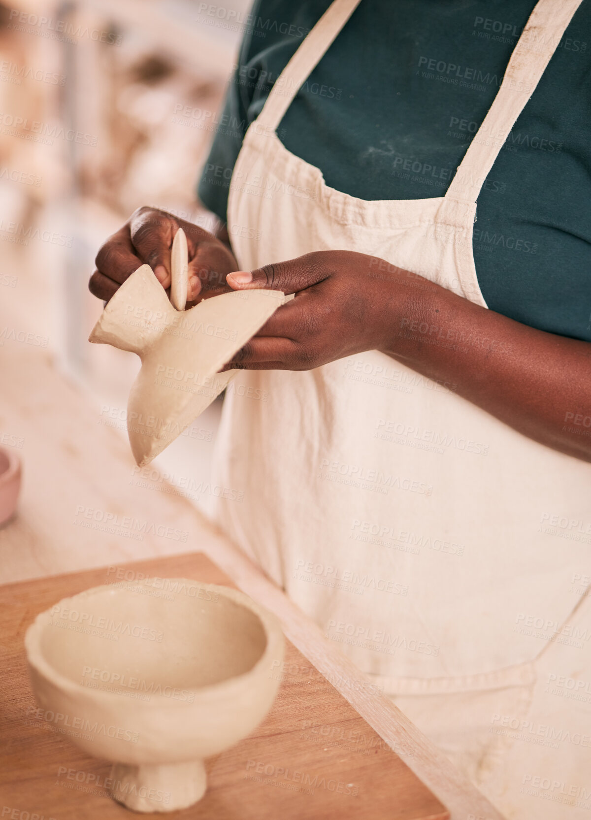 Buy stock photo Art, pottery and black woman hands in creative workshop with ceramics, sculpting and creativity with clay pot zoom. Artist, handmade craft and manufacturing, artistic process with texture and skill