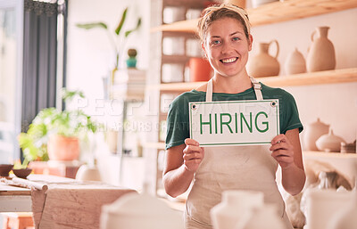 Buy stock photo Hiring sign, woman and small business owner in portrait for shop recruitment, retail job advertising and career manager. Boss, person or employer with hand holding message for onboarding opportunity