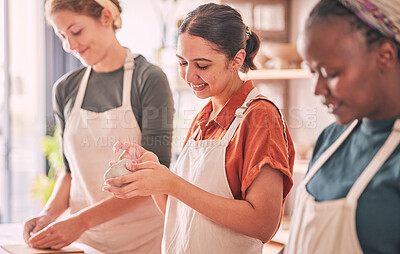 Buy stock photo Pottery class, women workshop or happy people design sculpture mold, clay manufacturing or art product. Diversity, ceramic retail store or startup small business owner, artist or studio group molding
