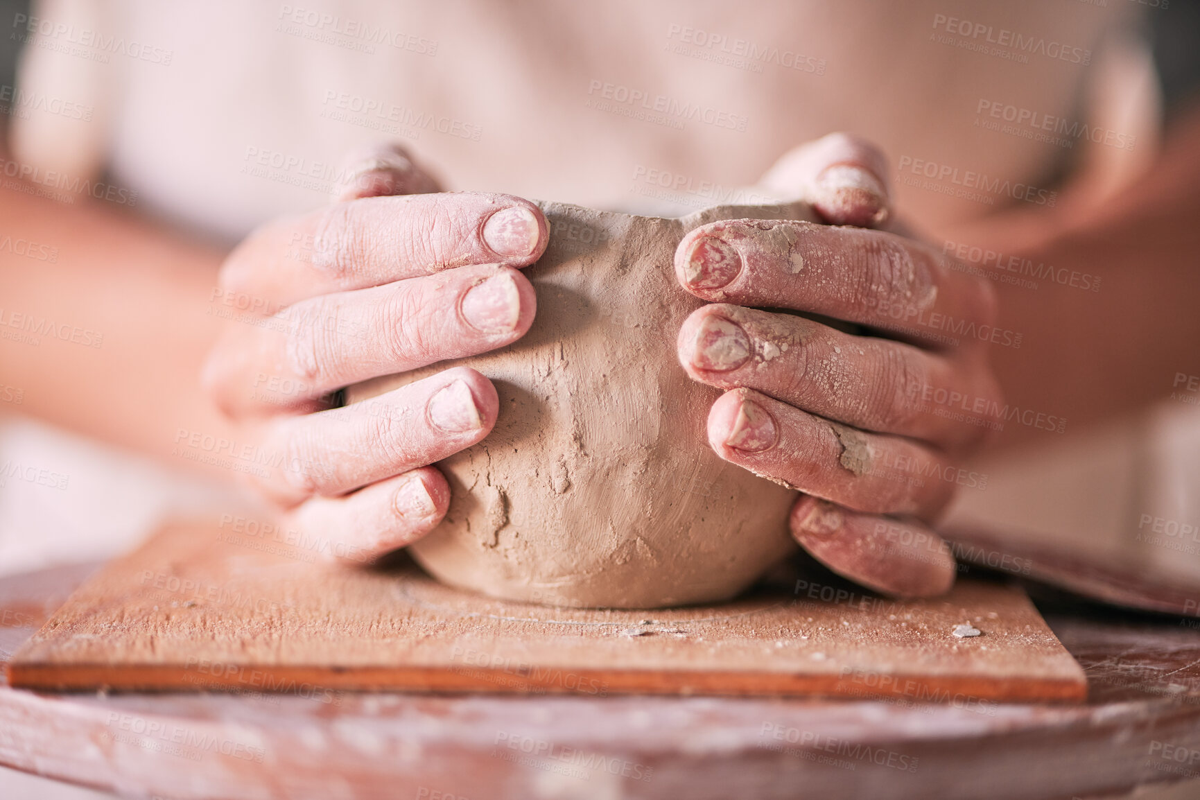 Buy stock photo Creative, pottery and design with hands of woman in workshop studio for mold, ceramics and art. Clay, sculpture and manufacturing with girl artisan on table for crafting, handmade and hobby
