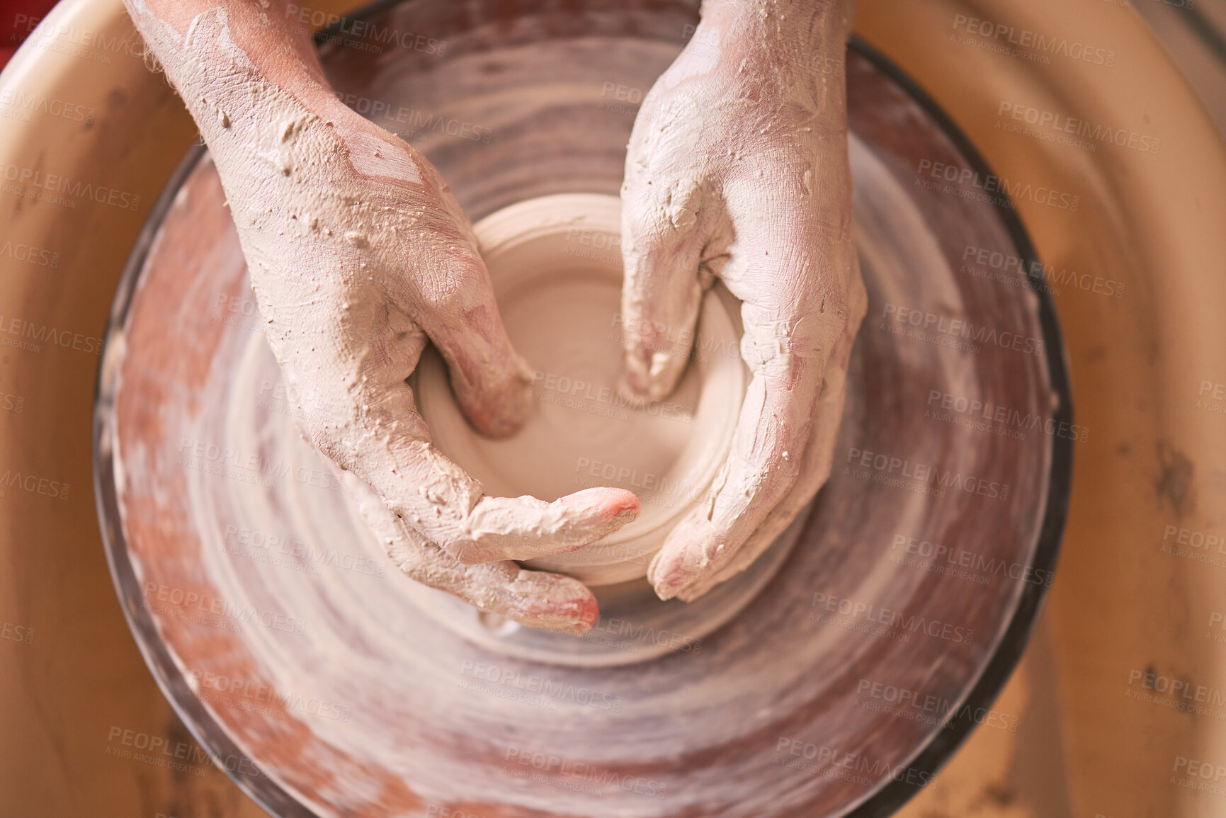 Buy stock photo Creative, pottery and design with hands of woman in workshop studio for molding, ceramics and art. Clay, sculpture and manufacturing with girl artisan on wheel for crafting, handmade and hobby
