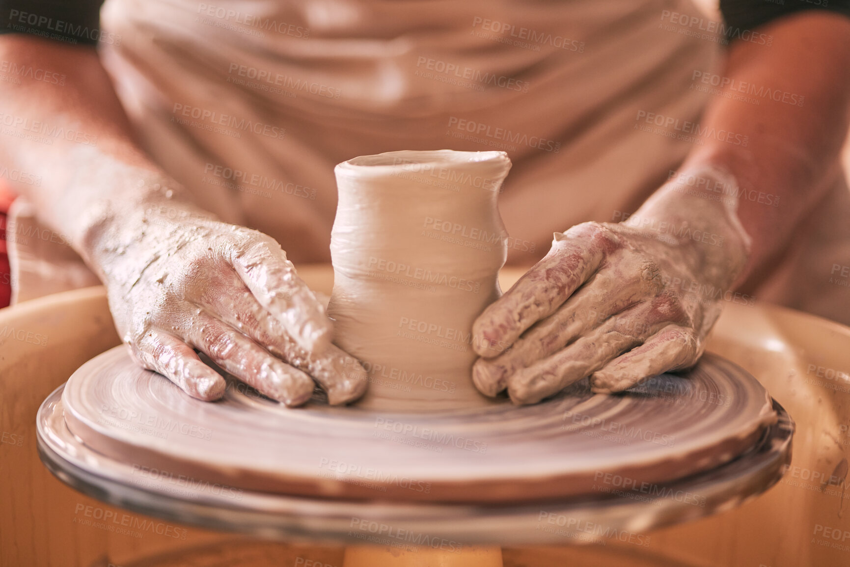 Buy stock photo Hands, pottery and clay mold on table for creative art design, product or sculpture for startup workshop. Hand of crafty artist molding ceramic material in creation, shape or tool with spinning wheel
