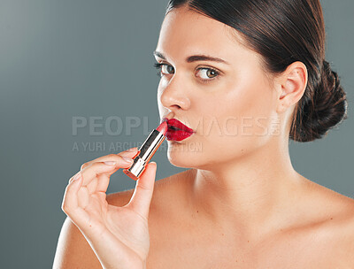 Buy stock photo Woman apply lipstick, red on lips and face in portrait with makeup and beauty isolated on studio background. Cosmetic product, skin and skincare glow with wellness, facial and cosmetics shine