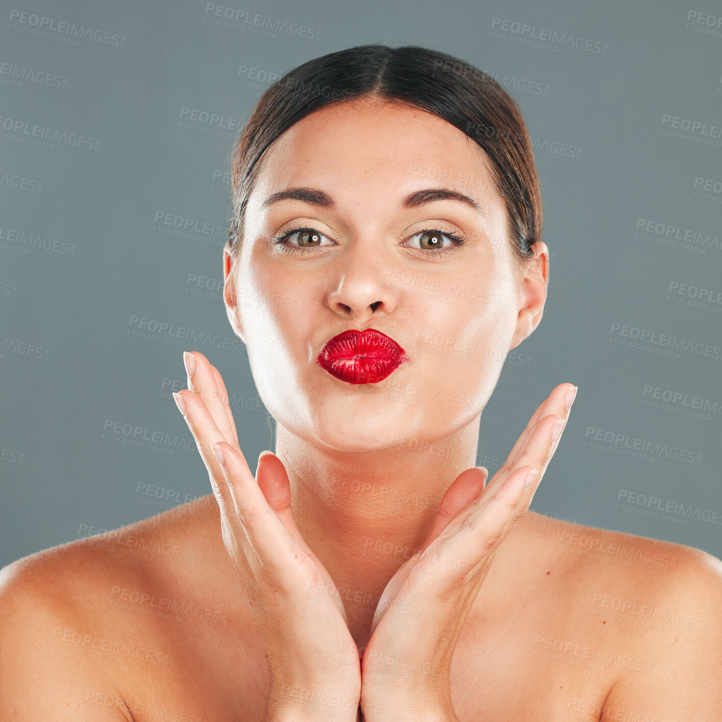 Buy stock photo Portrait, woman lips with lipstick and kiss face, red cosmetics and playful pout isolated on studio background. Makeup, beauty and skincare with cosmetic care, wellness and glow, facial and fun