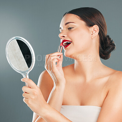 Buy stock photo Red lipstick, mirror and woman face with smile happy with cosmetics and makeup brush. Mouth, female and beauty model looking at reflection with cosmetic tool with studio background and lips product
