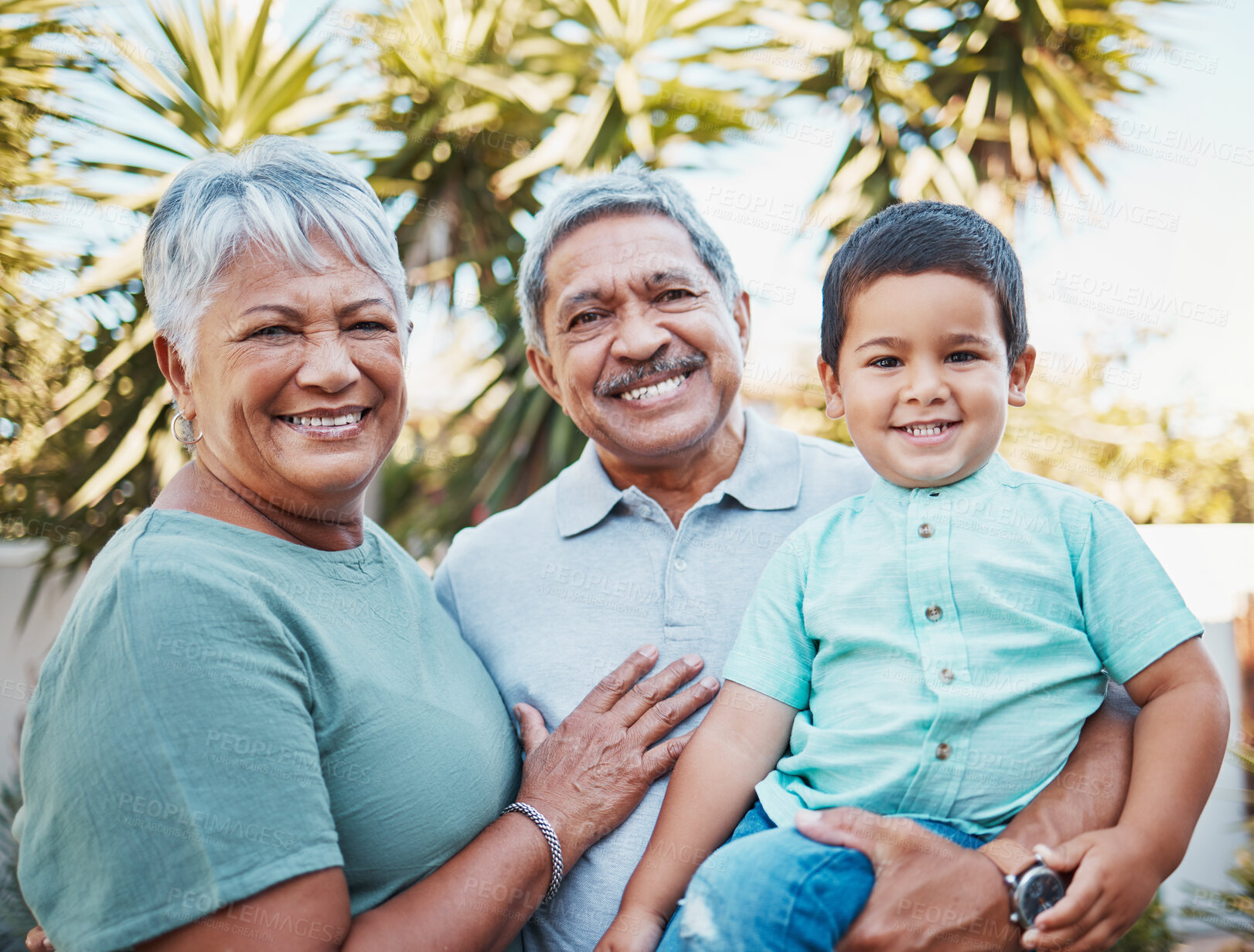 Buy stock photo Grandparents, child and portrait outdoor in a garden with love, care and kid support. Smile, happy and Mexican family together with kid and senior people in sunshine in a park with children in nature